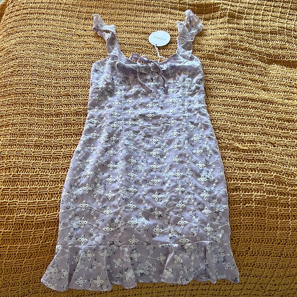 Purple floral dress size small. New with tags